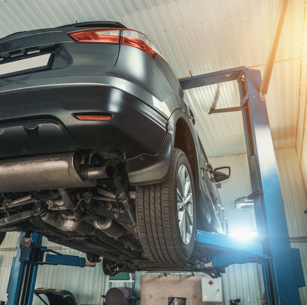 Vehicle on a ramp having its MOT - MOT Testing Holderness